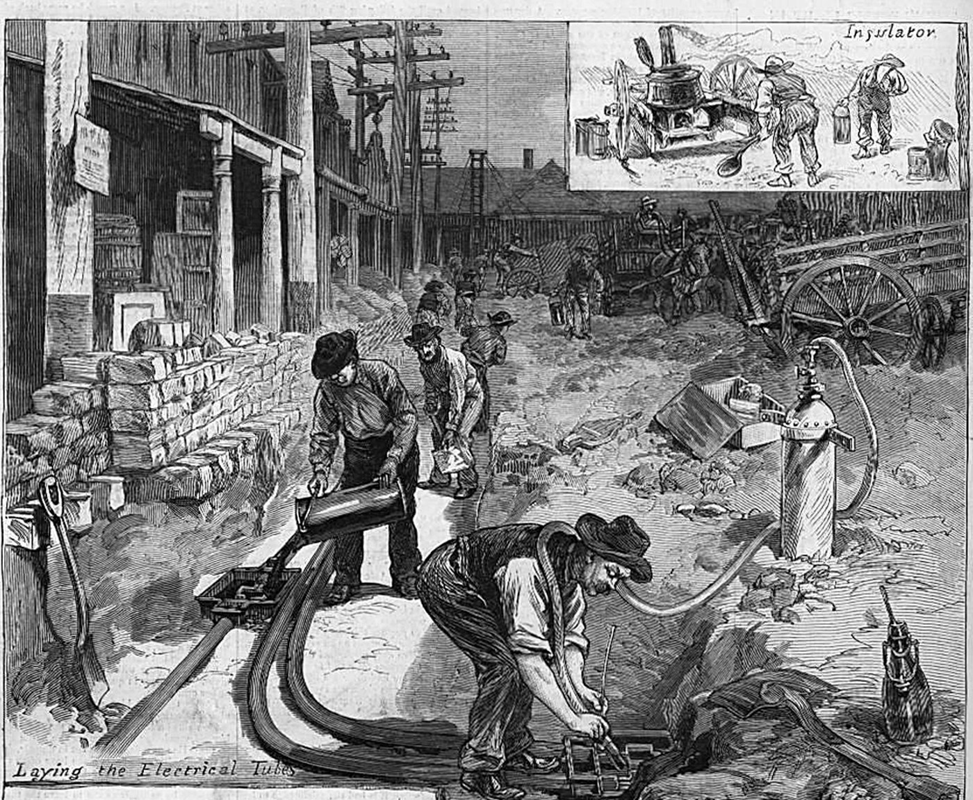 1882 engraving of workmen burying electrical conduit in a New York street